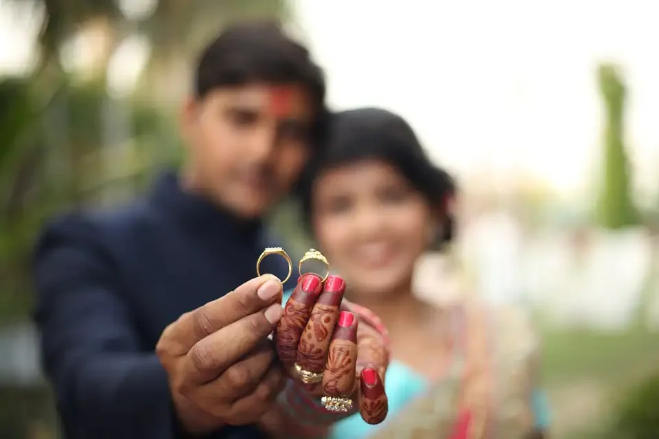 Wedding rings symbolising an intercaste marriage eligible for ₹2,50,000 assistance under the Savitaben Ambedkar intercaste marriage scheme Gujarat