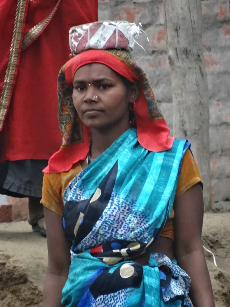 Woman construction worker in India — Shramik Basera Yojana provides Rs 5 per day housing for workers